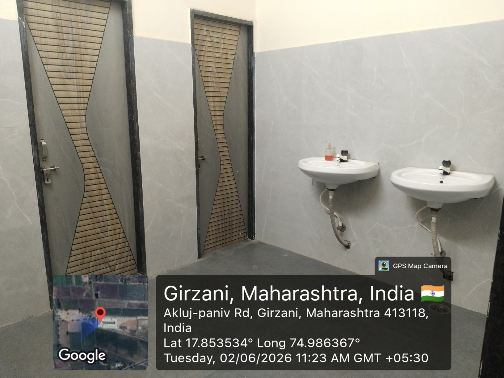 Clean washroom interior with child-height fittings